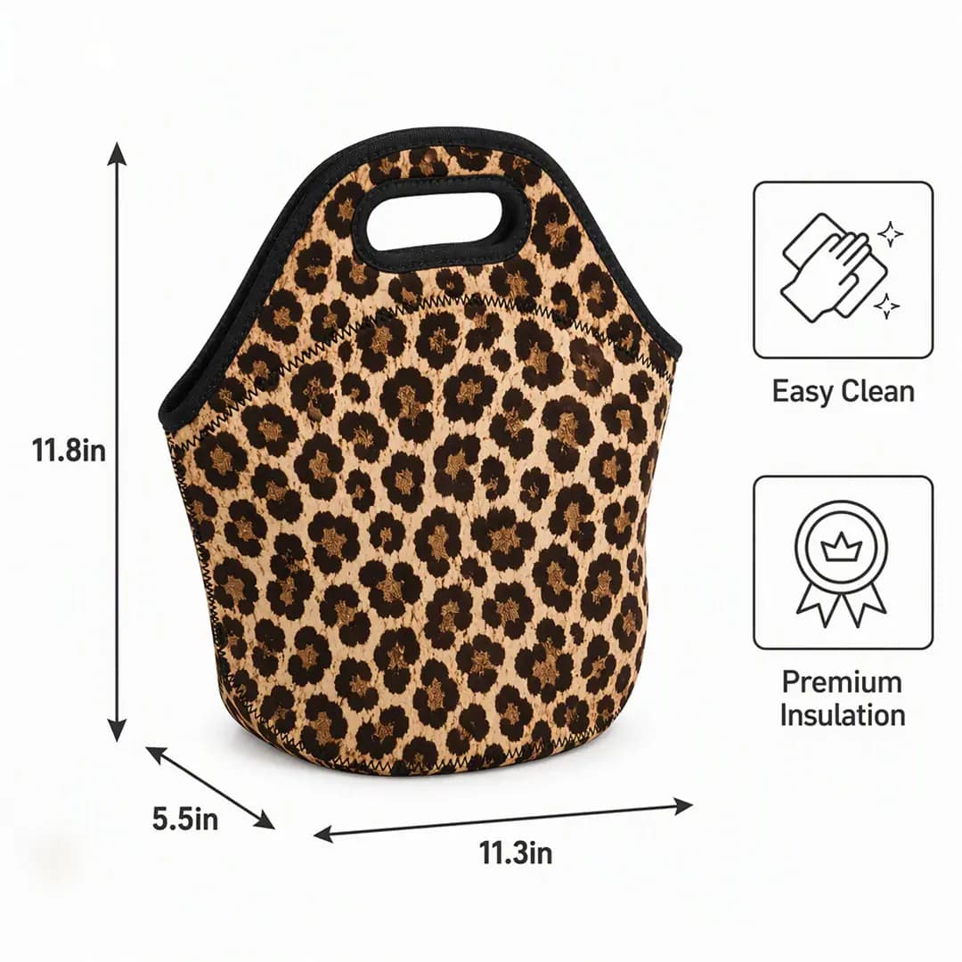 Leopard print neoprene insulated lunch tote 11.3 x 11.8 x 5.5 in with black bound edges, zigzag stitching and an integrated cut-out top handle