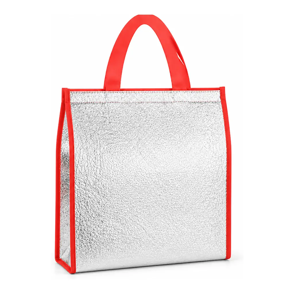 Two aluminum foil insulated bags with crinkled silver foil bodies, one with red binding and handles and one with black, standing on a kitchen counter