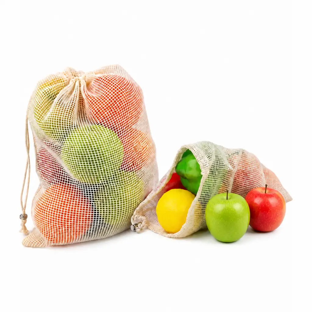 Natural cotton mesh produce bag 30x36cm filled with apples and oranges, cotton drawstring with metal cord lock, undyed natural color