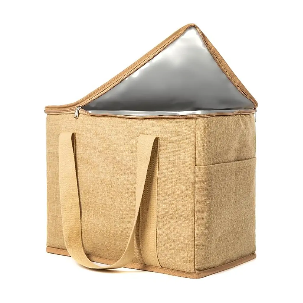 Natural jute insulated grocery cooler bag 15 x 12 x 9 in with a zippered lid, two side pockets and tan webbing handles, shown closed on a white background with dimension marks