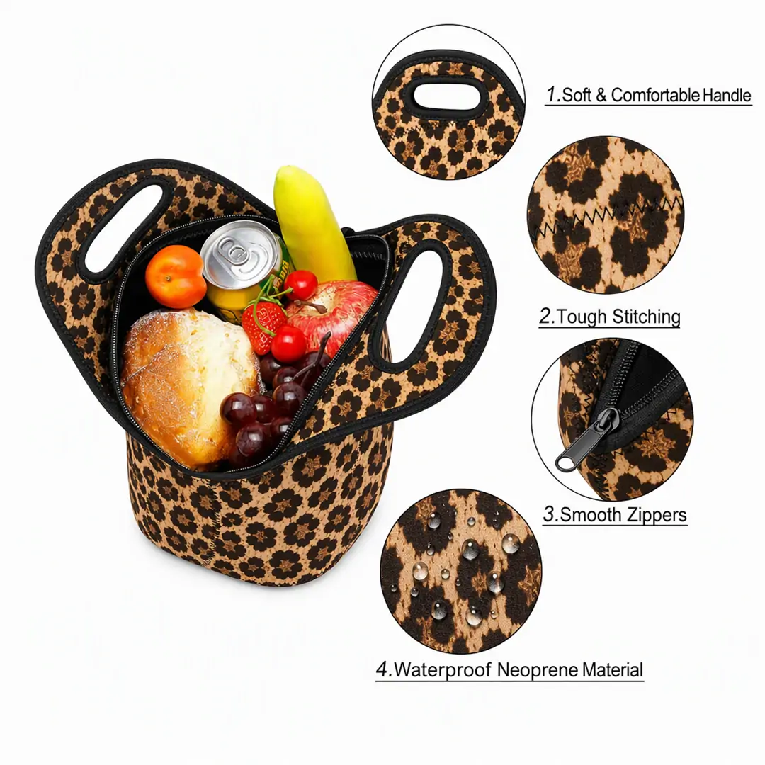 Leopard print neoprene insulated lunch tote 11.3 x 11.8 x 5.5 in with black bound edges, zigzag stitching and an integrated cut-out top handle