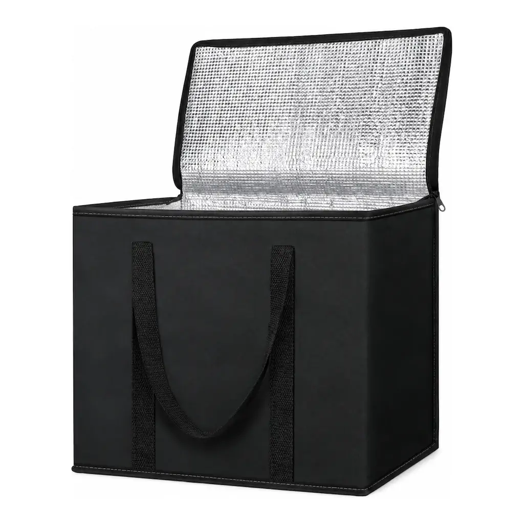 Black non-woven insulated grocery cooler bag 16 x 13 x 9 in with a zippered lid, webbing handles and a foil-lined interior filled with fresh produce, with close-up detail circles o