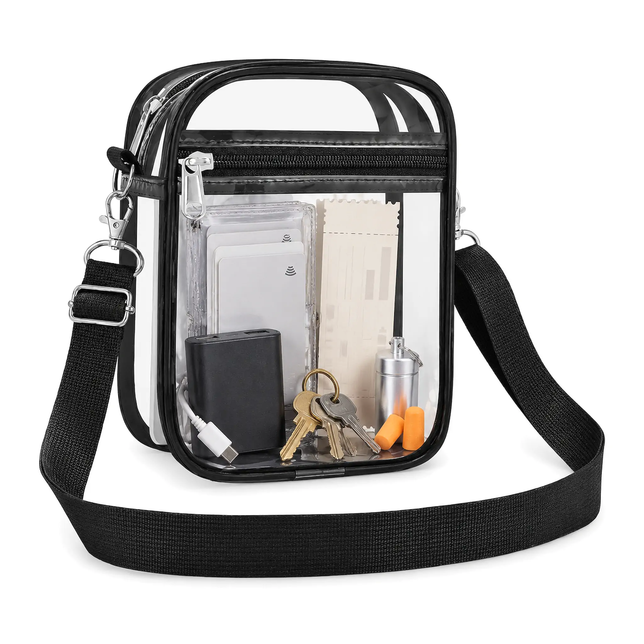 Clear PVC crossbody stadium bag 8.3 x 6.6 x 2.8 in with mint green binding, metal snap-hook strap and two zip compartments, shown filled with cosmetics on a white background