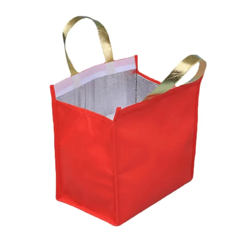 Red non-woven insulated lunch tote bag with handles and zipper closure