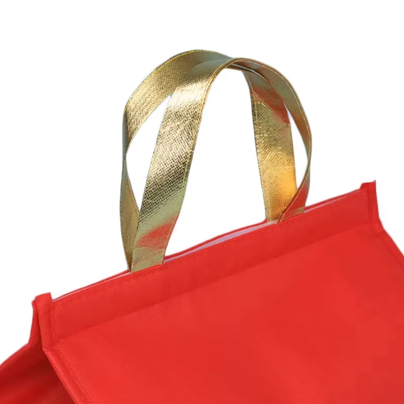 Red non-woven insulated lunch tote bag with handles and zipper closure