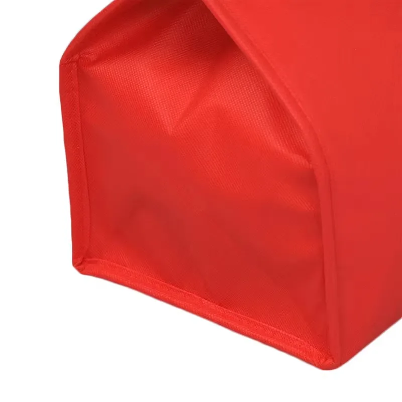 Red non-woven insulated lunch tote bag with handles and zipper closure